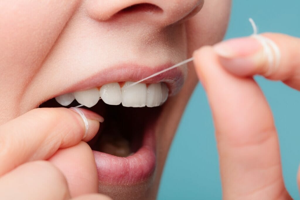 flossing recommended by family dentist in kitchener